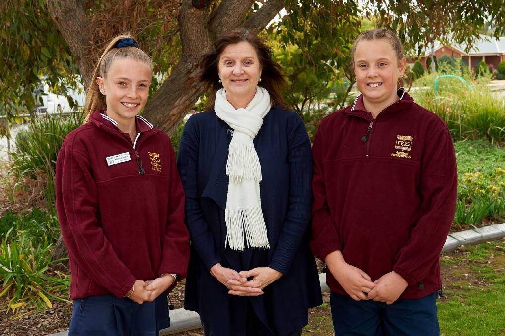 Ganmain Public School captain Abbey Hamblin with school principal Sandy Schmid and vice-captain Chloe Clark. The school leaders will run the official part of the celebrations on Saturday October 7.