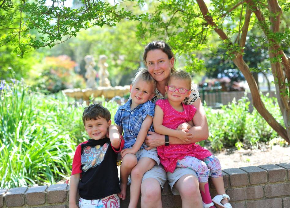 Motherly support: Tina Davis with her kids Josh 5, Henry 3 and Emma 3. Mrs Davis is organising a free night out for local mums on November 28. Picture: Laura Hardwick.