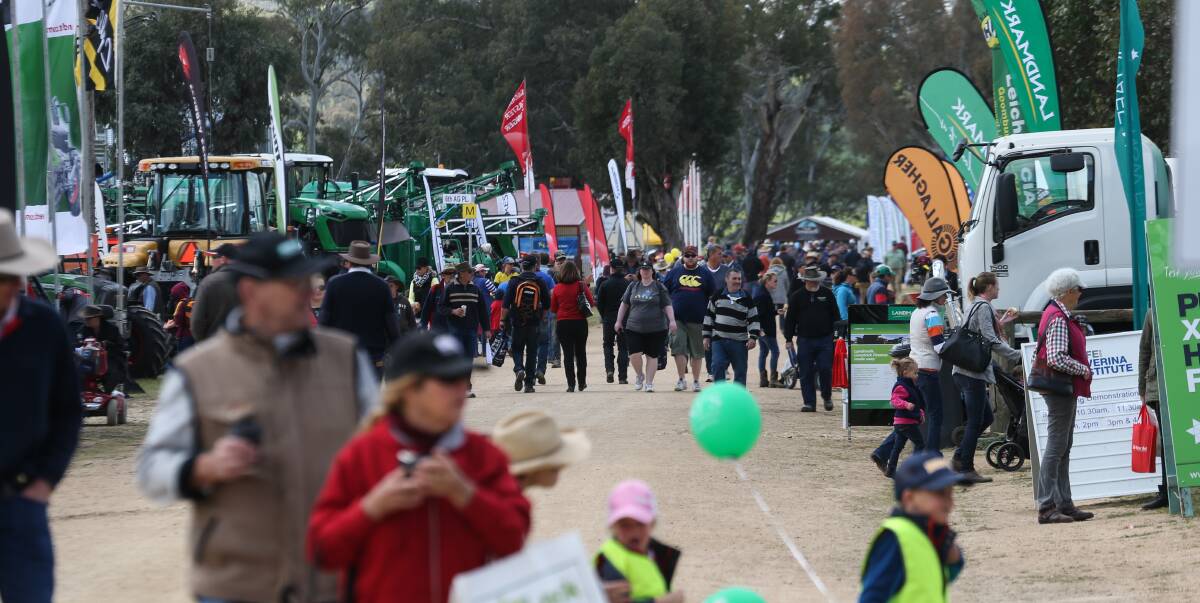 Crowds: More than 60,000 people are expected to attend the Henty Machinery Field Days over the three days. The 800 exhibitors are expected to make good sales thanks to the strong start to the season.