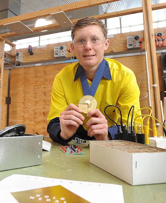 Top spot: Callum Clayton took out gold in the VETiS Electrotechnology competition in Melbourne last week. Picture: Laura Hardwick. 