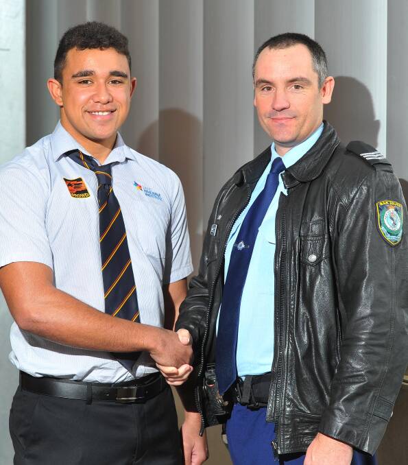 HIGH ACHIEVER: Budding police trainee and Gibbs award winner Benjamin Pittman with his mentor, Hay police sergeant Ben Clavel. Picture: Kieren L. Tilly