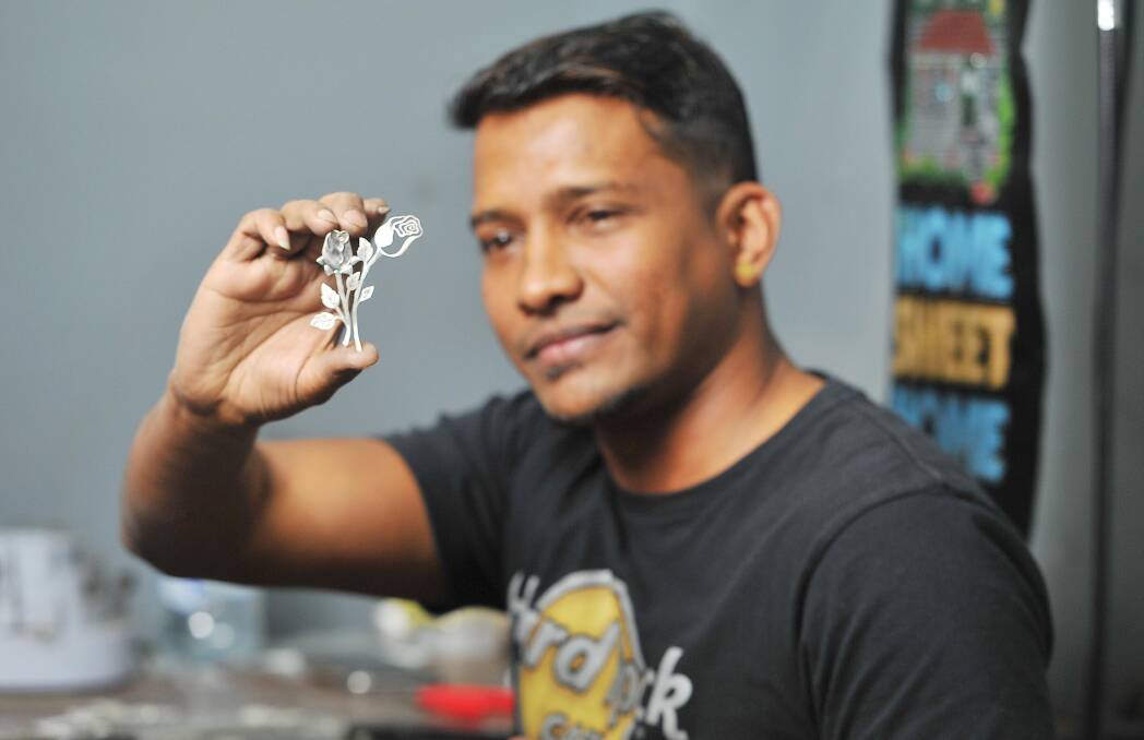 NEW WINNER: 3rd generation family jeweller Cowri Sankar with parts of the crown taking shape. Picture: Kieren L. Tilly
