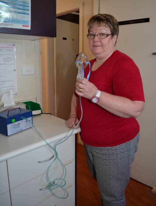 EMERGENCY HELP: Kooringal Medical Centre registered nurse Jenny Hulm with a nebuliser, which is used to get oxygen quickly during a severe asthma attack. 