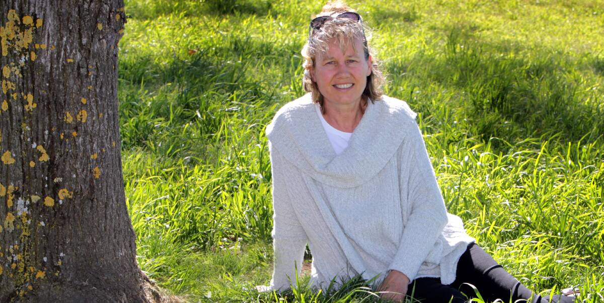 GRASS IS GREENER: Businesswoman Lisa Metcalfe has made it through her depression and leads a happy, full life. She now helps others through her work with Riverina Bluebell.  Picture: Les Smith