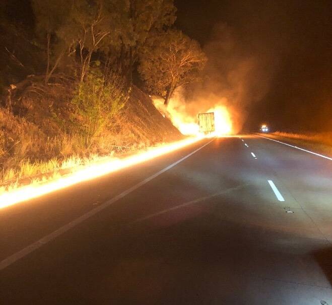 ALIGHT: Emergency services respond to early morning truck fire on the Hume Highway near Snowy Mountains intersection. Picture: Riverina Police District 