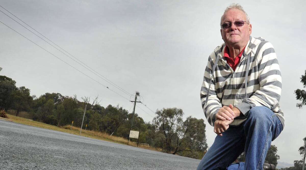 Barbecues Galore owner Garry Gurtner is worried about the number of cars for sale near a busy city intersection.