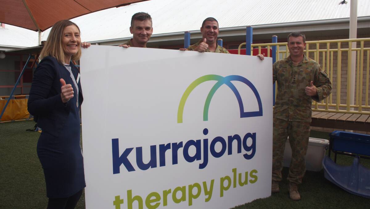 Susan Macgillycuddy from Kurrajong Therapy Plus thanks Kapooka's Mick Garraway, Beau Cox and Aaron Oldaker.