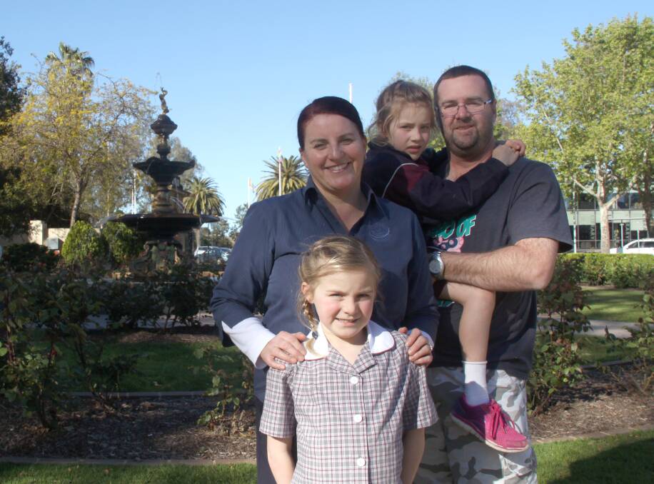CHANGE: Claire and David Buchtmann with their daughters Hannah, 8 and Sophie, 6, moved to Wagga from Penrith and love the lifestyle.