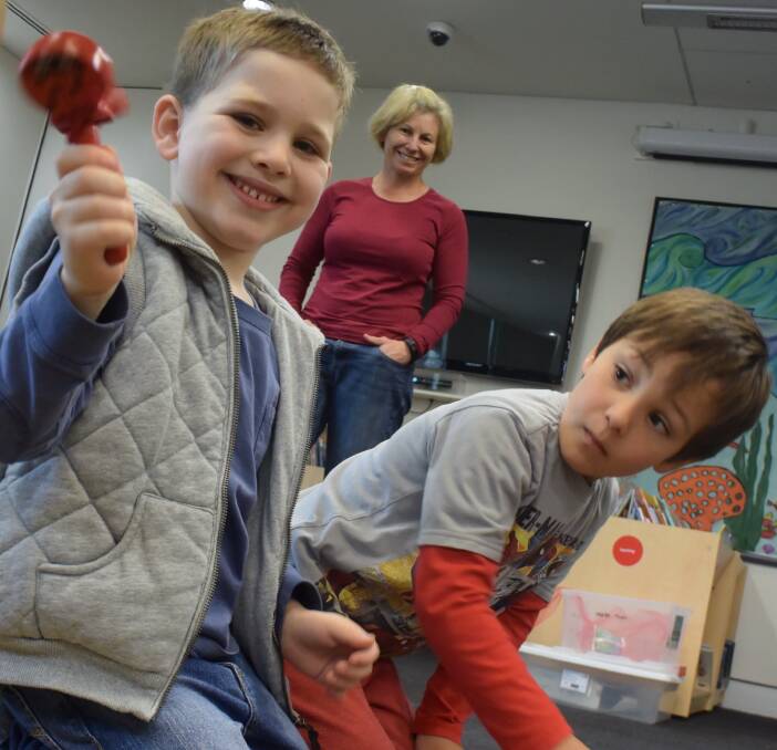 FUN: Max Olsen, 6 and Griffin Beachley, 4, make some noise at Wagga Toy Library on Saturday morning. The group, which is about 30 years old, gives families access to a range of toys for a small cost. Picture: Stephen Mudd.
