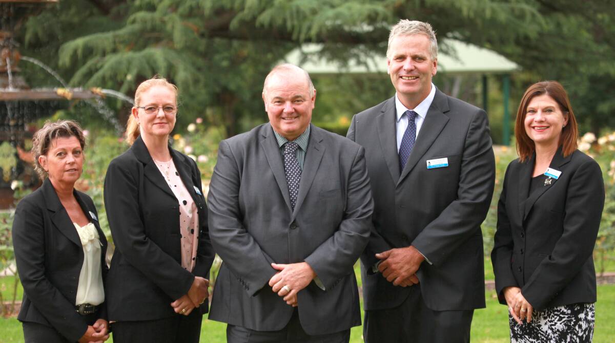 NEW TEAM: Wagga council's new sector managers Caroline Angel, Natalie Te Pohe, Paul Somerville and Janice Summerhayes with general manager Alan Eldridge (centre).