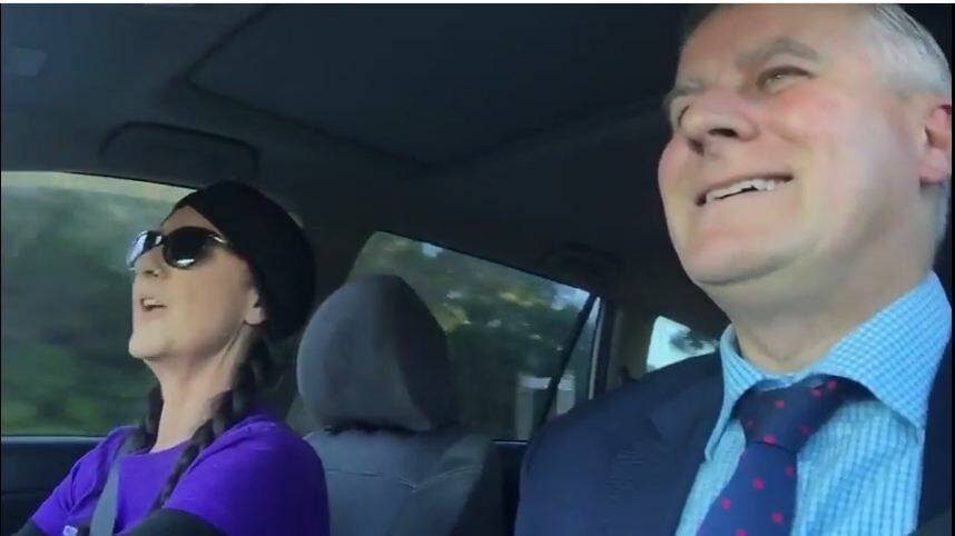 SING-OFF: Michael McCormack sings Down Under during a rendition of carpool karaoke. Picture: YouTube.