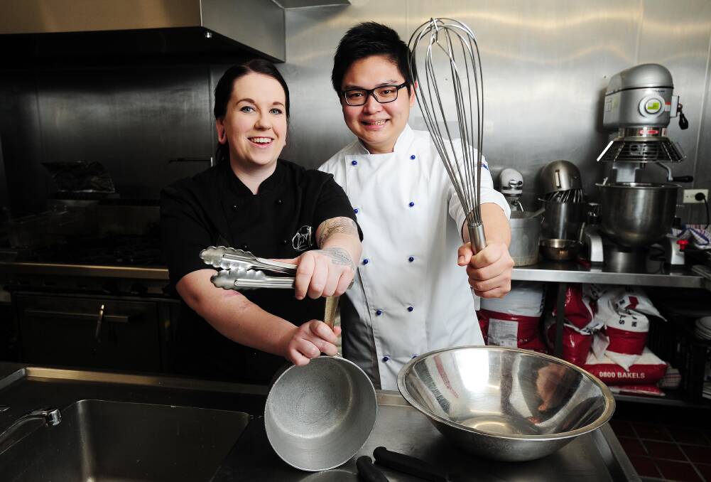 MASTERCHEFS: Pastry chef Harrison Ng and second-year apprentice chef Jessica Glass are readying for battle. Picture: Kieren L. Tilly
