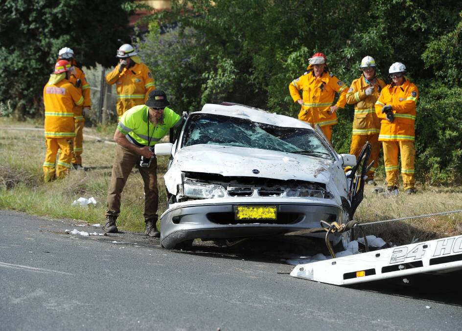 Emergency services clear the wreckage on Holbrook Road. Picture: Laura Hardwick