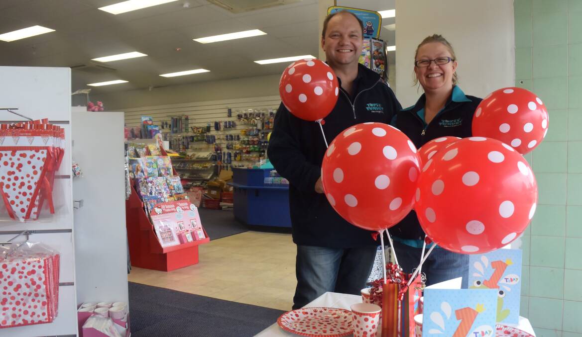 PARTY ON: David Ritter and Julie Heath have expanded their product line at the Topsy Turvey Newsagency so they are not reliant on lottery sales. Picture: Ken Grimson