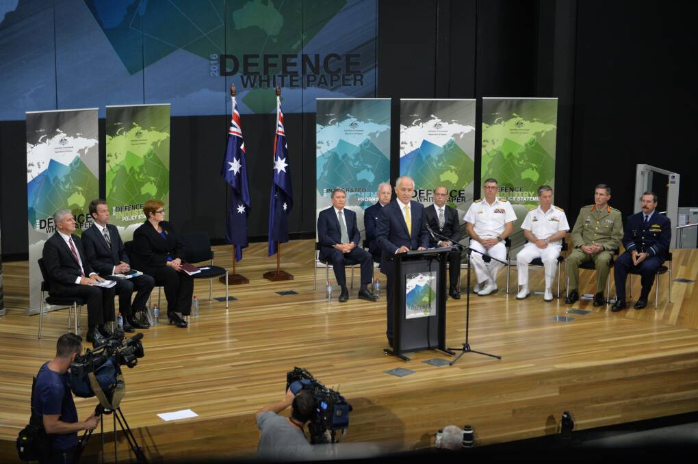WHITE PAPER: Prime Minister Malcolm Turnbull speaks on the Defence white paper at the Australian Defence Force Academy watched by Defence leadership and (from left) Michael McCormack, Dah Tehan (Minister for Defence Materiel) and Marise Payne (Minister for Defence). 