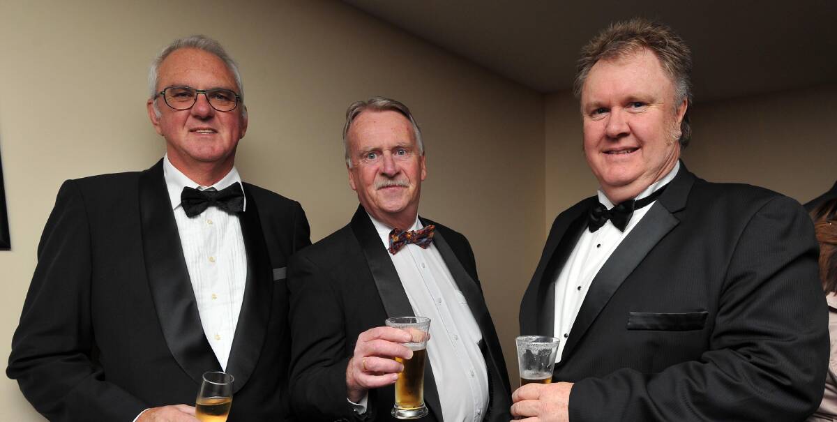 AWARD: Scott Nash (left), Graham McGuiggan (centre) and Paul Maginnity at last year's Southern Central Regional Building Awards. Mr Nash died on March 17. Picture: Laura Hardwick