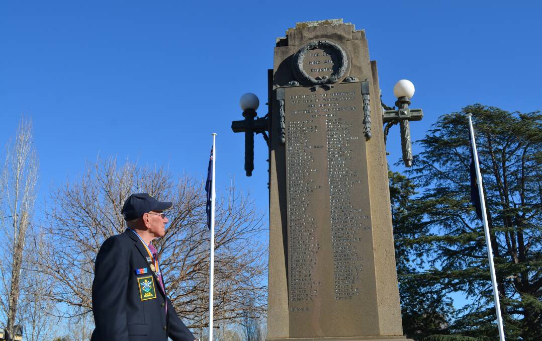 REMEMBRANCE: John Ploenges at the Wagga Cenotaph which includes the names of Wagga soldiers who fought in the Battle of Messines. Picture: Ken Grimson