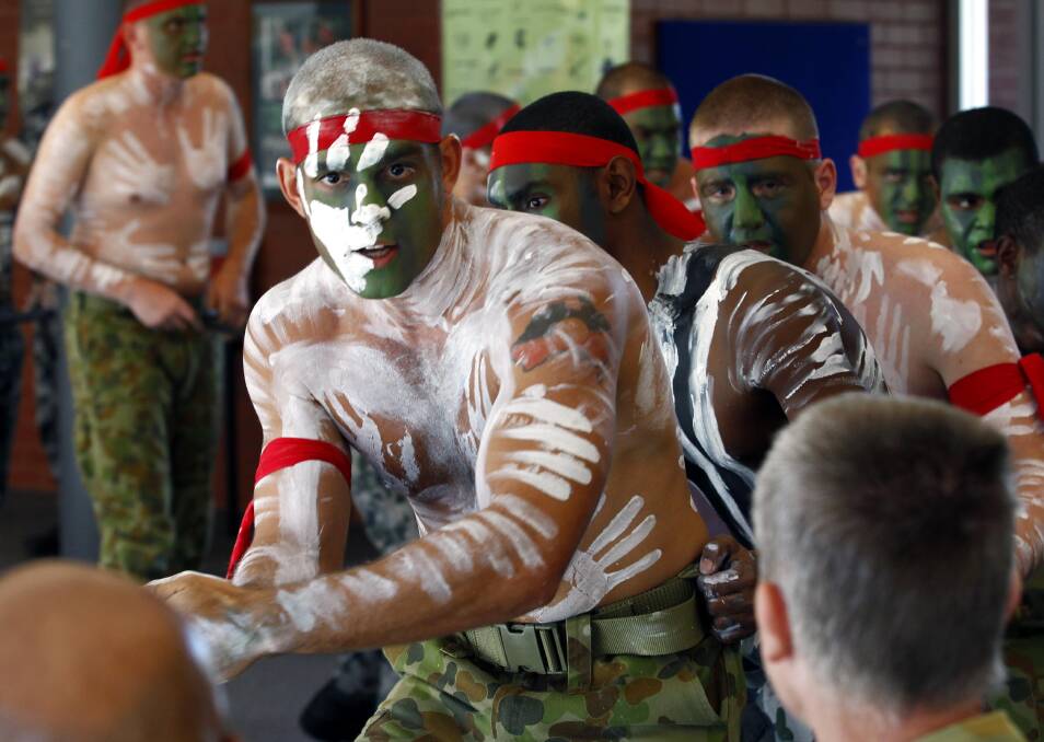 SNAKE DANCE: Australian Defence Force Indigenous pre-recruit James Dodd leads a traditional dance at a graduation ceremony for the latest Indigenous Pre-Recruitment Program at Kapooka. Picture: Les Smith