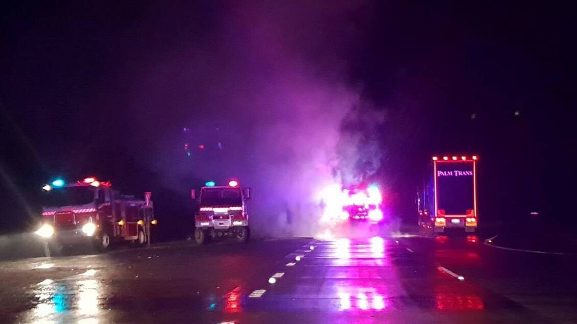 HIGHWAY AFFECTED: A truck carrying tonnes of paper rolls caught fire on the Hume Highway at Lower Tarcutta Road overnight. Picture: Riverina Police District