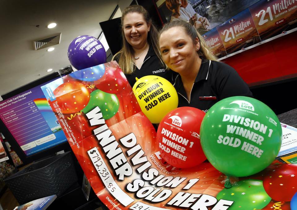 MYSTERY WINNER: Cassie Lees and Melissah Phillips from Nextra in the Sturt Mall celebrate selling the division one winning ticket. Picture: Les Smith 
