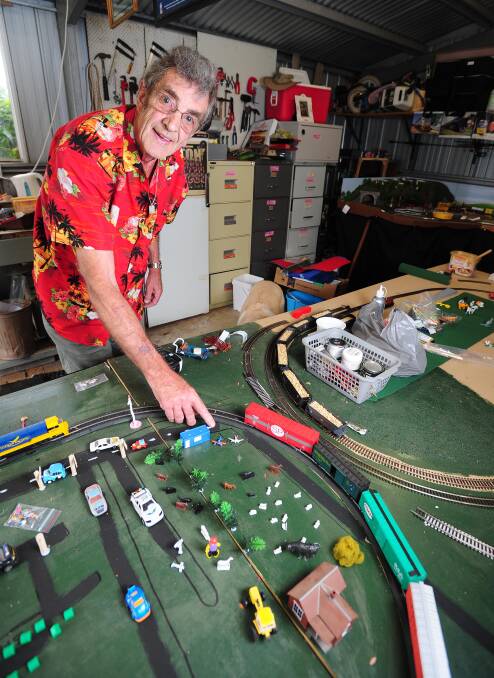 UNUSUAL HOBBY: Fred Velthuis has reproduced some model trains in a recreation of his home town. Picture: Kieren L Tilly 
