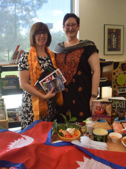TRAVEL: Monique Shepherd, who ran the session at Wagga library, with CSU's Wendy DeLuca, who attended the session. 