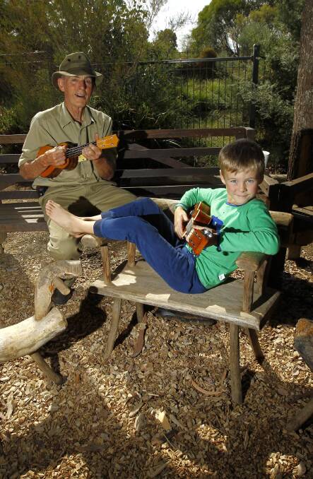 EARTH DAY: Woodworker and ukulele enthusiast Brian Beasley enjoying Erin Earth open day with Tasmania's Kalyan Quilty, 7. Picture: Les Smith 