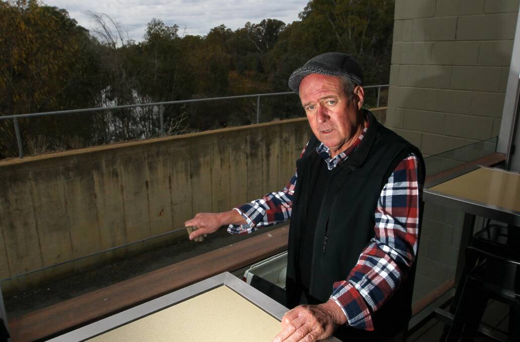 FLOOD FRENZY: The Duke owner Jack Egan, whose business backs onto the Murrumbidgee River, is extremely concerned about flooding. Picture: Les Smith
