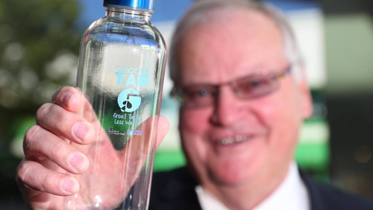 Riverina Water chairperson Cr. Greg Verdon with one of the new CHOOSE TAP water bottles. Picture: Kieren L. Tilly