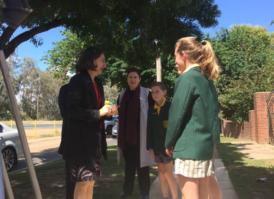 SCHOOL TIME: Premier Gladys Berejiklian is welcomed to North Wagga Public by student leaders and principal Mandy Crocker. 