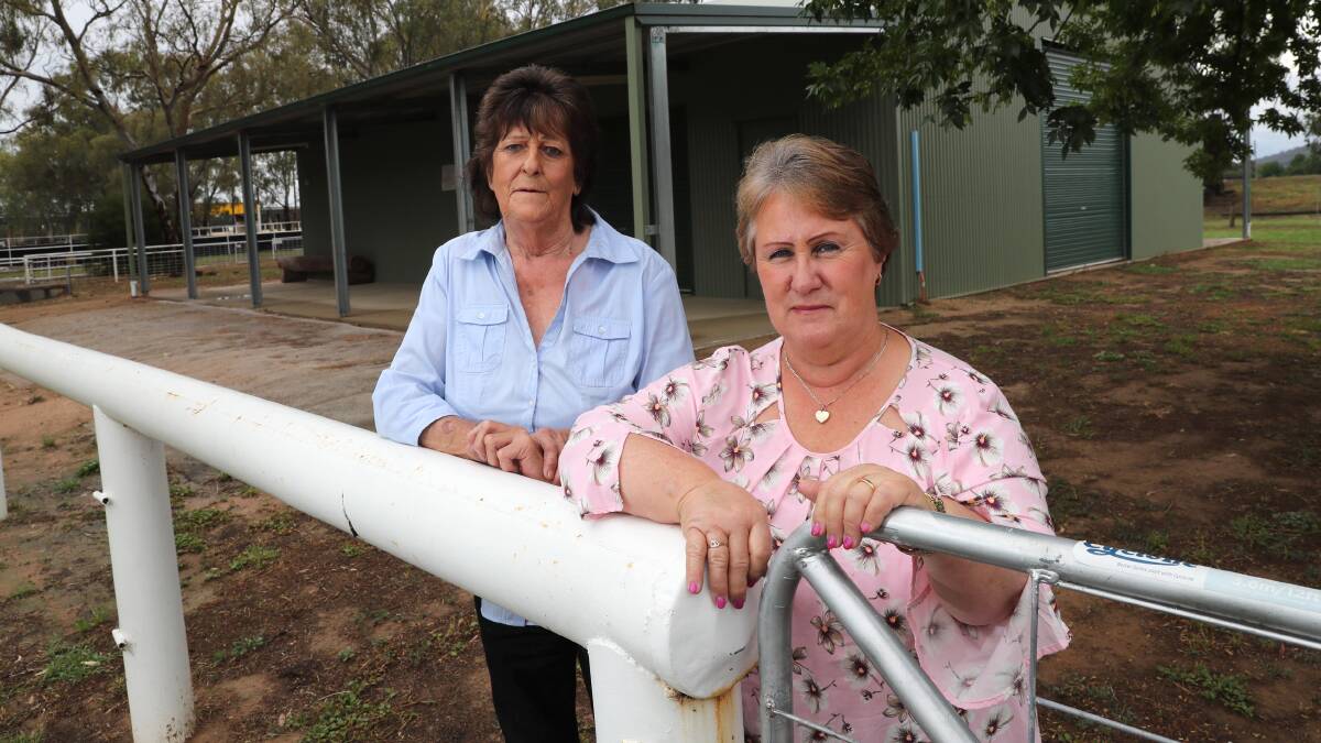 STOIC: Chief riding instructor Betty Miller (L) and club president Sandra Dennis in front of the new Wagga and Bidgee District Pony Club complex. It will take a flood of biblical proportions to stop them. Picture: Les Smith