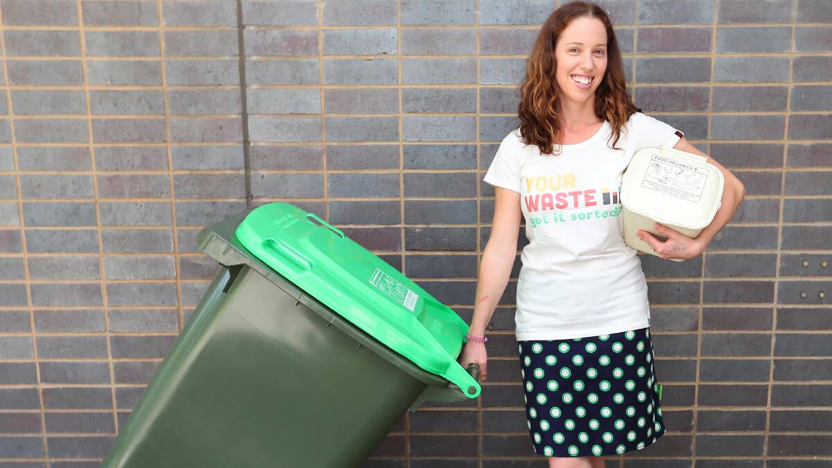 FRESH: Council waste education and communications officer Alice Kent showcases Wagga's latest bins. 