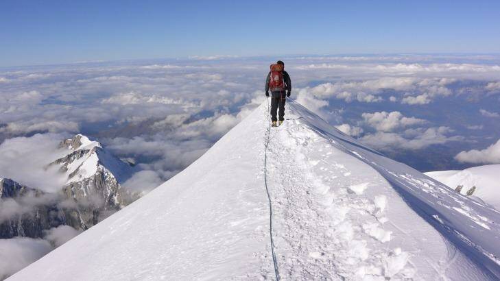 Huw Kingston stands on Mount Blanc Summit, France. Photo: Supplied
