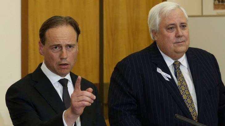 Greg Hunt and Clive Palmer in 2014. Photo: Andrew Meares