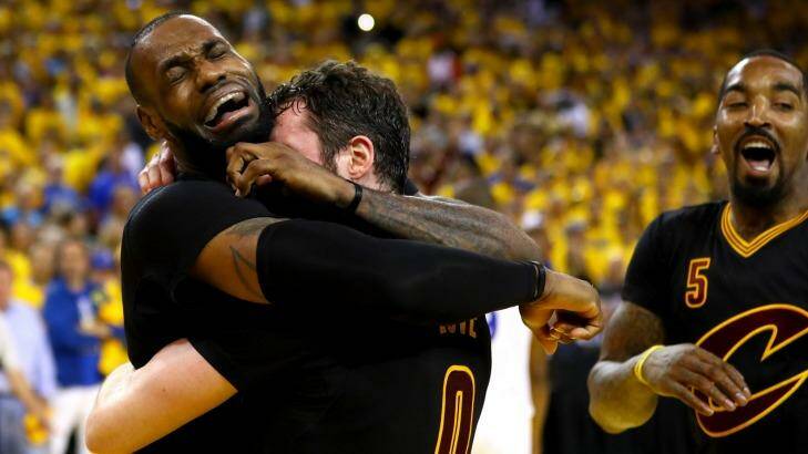Tears of joy: LeBron James celebrates with Kevin Love. Photo: Ezra Shaw