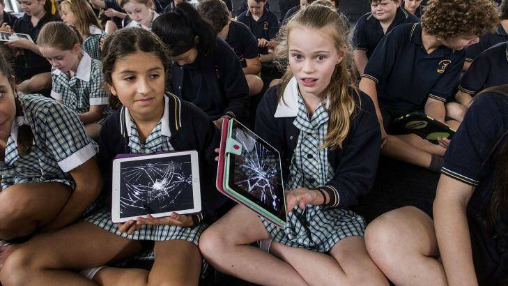 Grade 6 students (L-R) Anastasia, Nathalie, Rose and Vittoria at Donvale Primary School with iPads. There has been a boom in the use of iPads in schools. Photo: Paul Jeffers