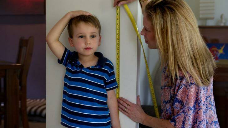 Measuring your child's height is a simple maths activity. Photo: Edwina Pickles