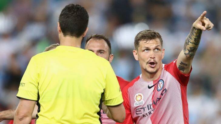 Michael Jakobsen of Melbourne City makes his point to referee Kris Griffith-Jones. Photo: Mark Kolbe