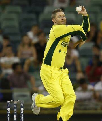 Bowling not batting: Australia's Michael Clarke in the match against Afghanistan. Photo: Theron Kirkman