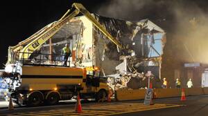 END OF AN ERA: The Red Lion is demolished last night. Picture: Addison Hamilton