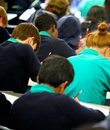 Pens down: students sit the NAPLAN test.  Photo: Rodger Cummins