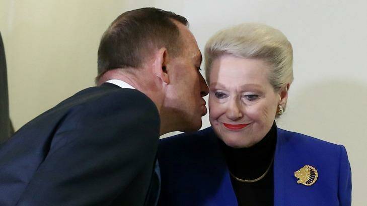 Mr Abbott kisses Bronwyn Bishop after she was replaced as speaker. Photo: Alex Ellinghausen