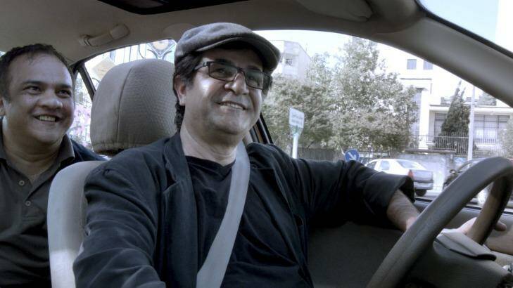 Jafar Panahi in <i>Tehran Taxi</i>.