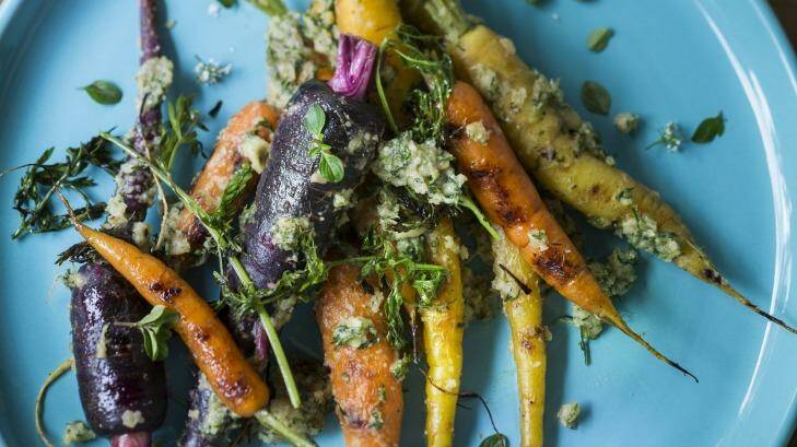 Carrots, tops, honey and black garlic  from Planet to Plate, the Earth Hour cookbook. Photo: Supplied