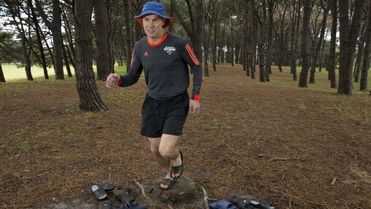 Philip Balnave will be running in the City2Surf this year wearing slippers instead of shoes. Photo: Shu Yeung