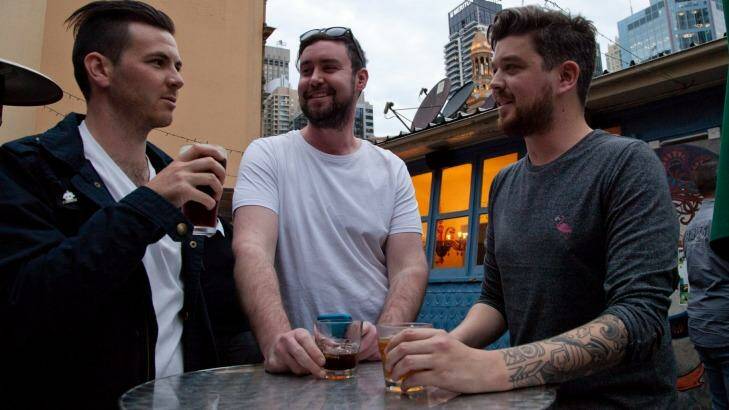 Corey Wakefield, Mike Harding and  Daniel Langton have a drink after work.  Photo:  Ryan Stuart