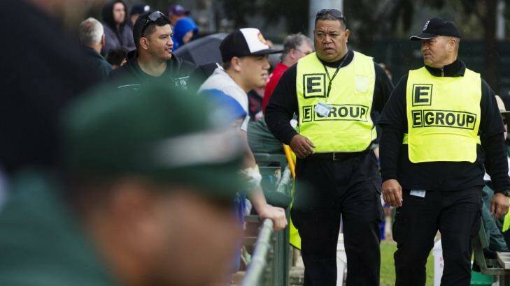 Precautions: Security guards Tonga Koli (left) and Itilani Latu from E Group security patrolling the Penrith and districts Junior Rugby League matches. Photo: James Brickwood
