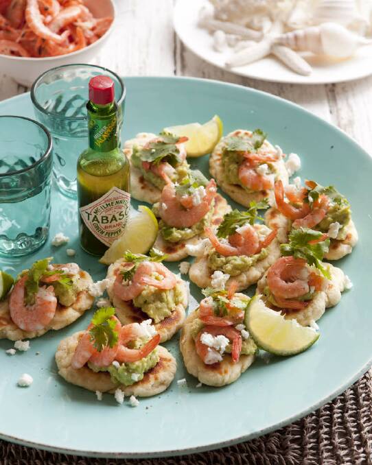Little prawn pizzas with avocado and lime <a href="http://www.goodfood.com.au/good-food/cook/recipe/little-prawn-pizzas-with-avocado-and-lime-20111128-29u7j.html"><b>(recipe here).</b></a> Photo: Marina Oliphant