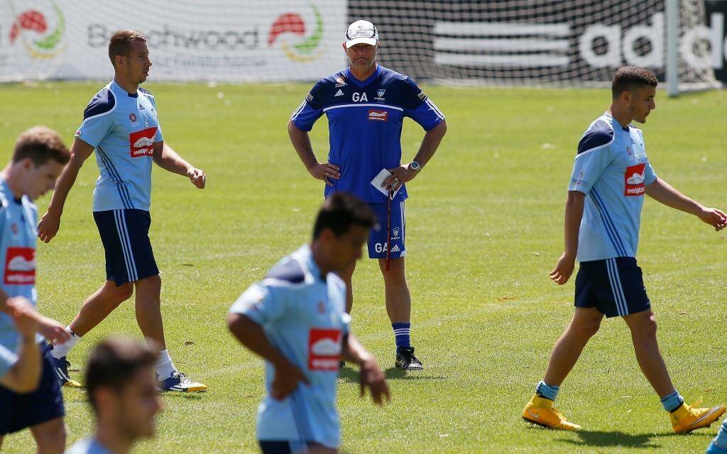 Mind games: Sydney FC coach Graham Arnold oversees a training session on Thursday. Photo: Daniel Munoz