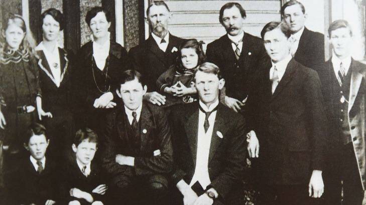 Family photograph of Spencer and Eliza Cottee with their 11 children including Harold Warnock Cottee (first row, second from right). From the book <i>Cottee's: A Family Favourite, Celebrating 75 Years</I>.